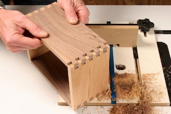 Using router and box joint jig to cut plywood panels