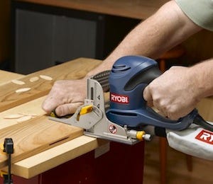 Using biscuit joiner to cut miter slots