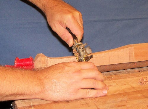 Using spokeshave to round out table leg blank