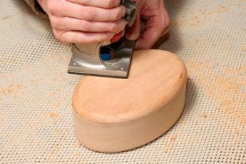 Using a trim router bit to cut smooth edges on keepsake box