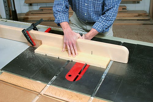 Using dado blade to cut spaces for router bit storage cabinet shelving