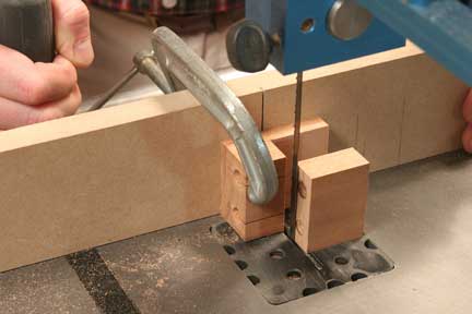 Using band saw to cut out dowel jig base