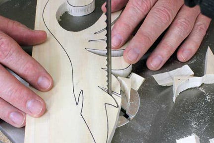 Cutting individual points of band saw leaf pattern