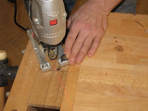 Cutting out napkin holder slot with handheld jigsaw