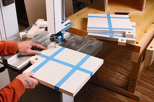 Using band saw to cut out saw blade storage trays