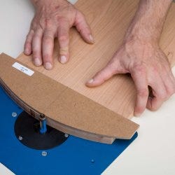 Routing top of arched door panel using template guide