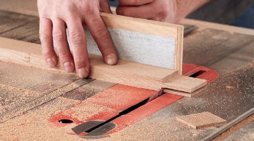 Using miter gauge to guide tenon cuts