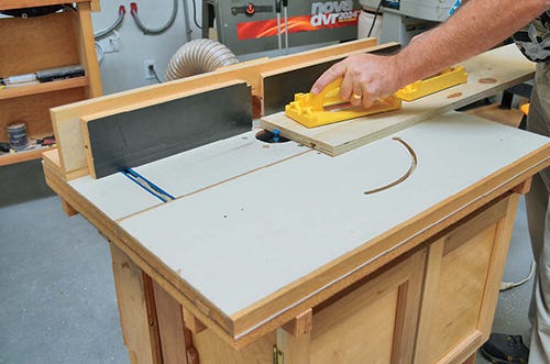 Routing slots for installing t-track in miter saw station