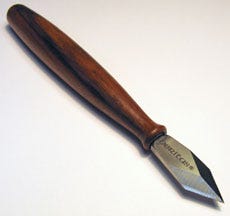 Marking knife with a wood handle and a double beveled edging