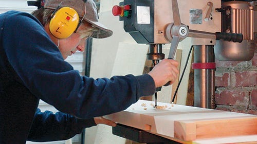 Using drill press to cut bench dog holes in mini workbench
