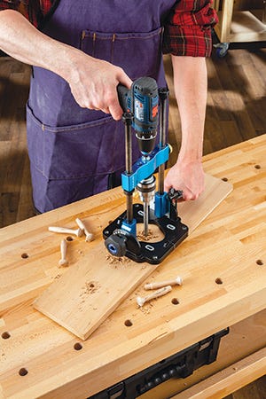 Drilling through chuck on drilling guide