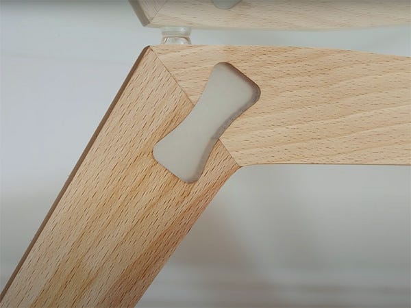 Coffee table leg joint with an epoxy inlay lock