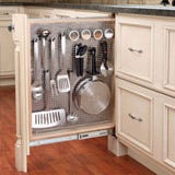 Narrow space-filling storage cabinet