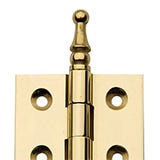 Finial tip on a cabinet hinge end