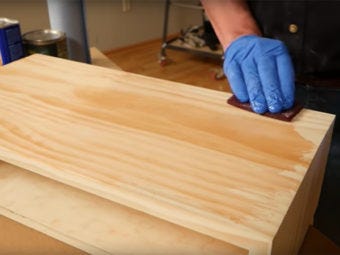 Applying a shellac finish to a piece of pine