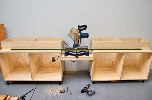 Straight edge across miter saw bed and cabinetry