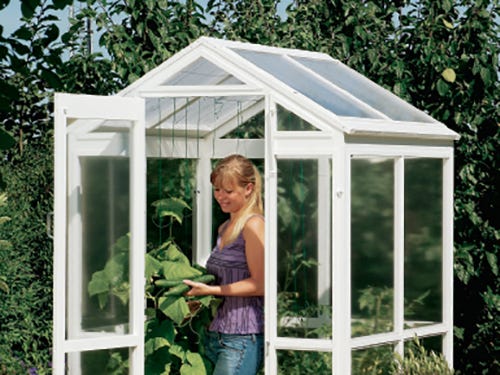 Small backyard greenhouse designed to be folded and stored
