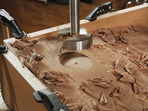 Drilling leg insert locations with forstner bit