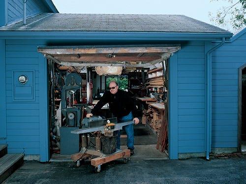 Woodworking shop set up inside garage