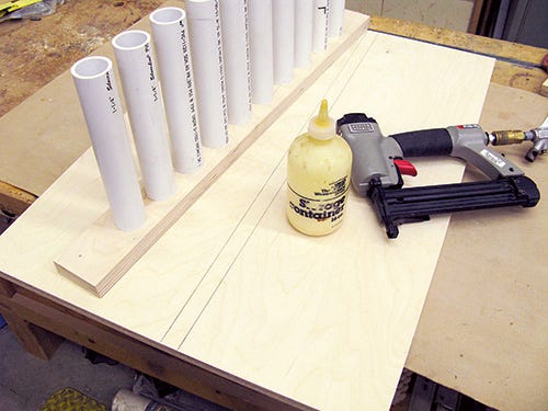 Gluing pvc pipes to panel for tool holding