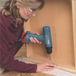 Screwing drawer front to drawer casework