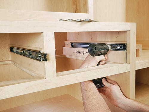 Installing drawer slides into cabinetry