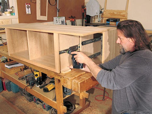 Installing drawer slides in media center cabinet