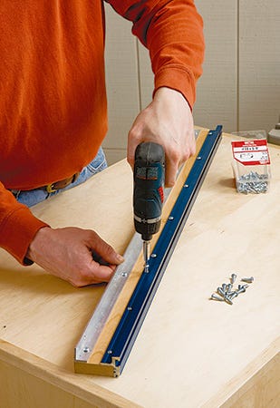 Assembling parts of t-track miter saw fence