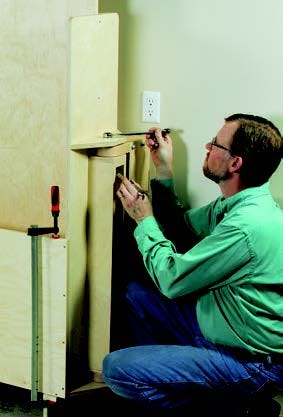 Adding spacers to swing out plywood storage system