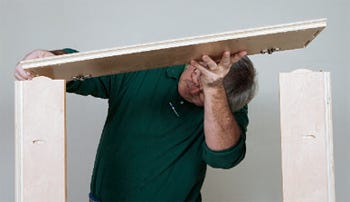 Lowering cabinet top in place during glue-up