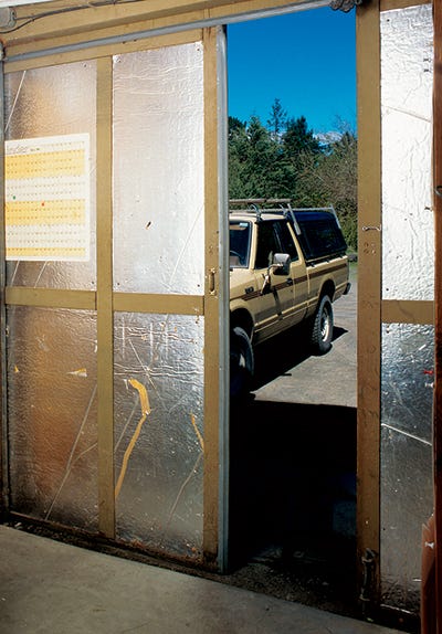Panels of insulation installed inside workshop door