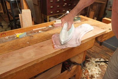 https://www.rockler.com/media/wysiwyg/Learn/ironing-towel-to-raise-dent_in-wood.jpg