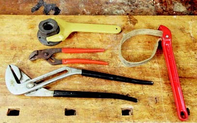Wrenches for making adjustments to lathe attachments