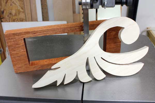 Drawer casing front and leaf design cut at a band saw