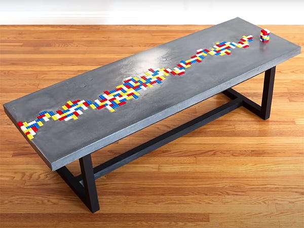 Concrete topped coffee table with lego toy river