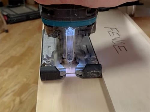 Using scrap fence to guide jigsaw cut