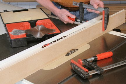 Clamping sacrificial fence to table saw to line up relief cut