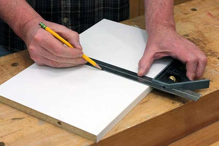 Using combination square to mark centerline on circle cutting jig