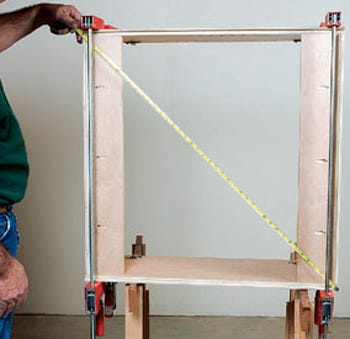 Ensuring cabinet is square before final fastening
