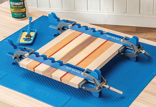 mini deluxe panel clamps on cutting board