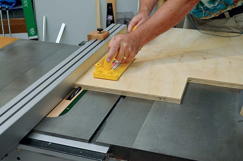 Cutting rabbet slot in miter station cabinet side