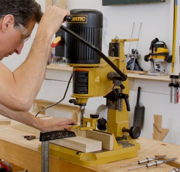 cutting mortises with a hollow chisel mortising machine