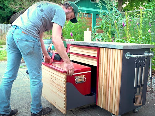 Opening cooler stored under barbecue grill