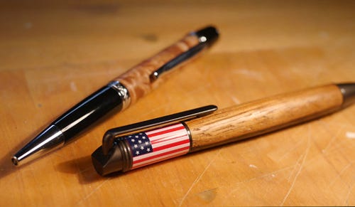 two wood pens