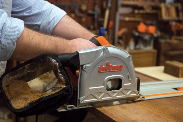 person using triton saw