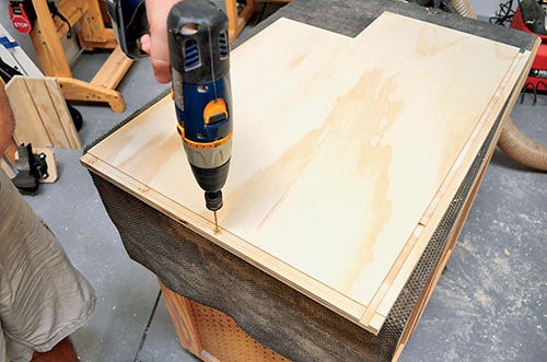 Drilling pilot holes for assembling miter station sides