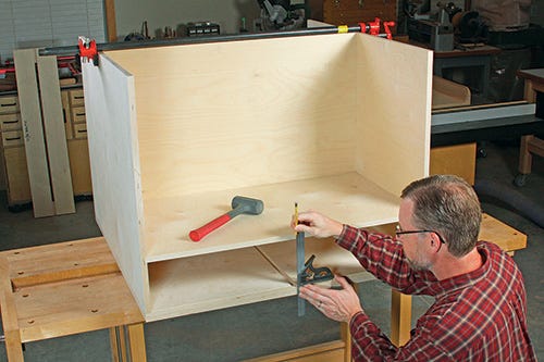 Measuring space in cabinet for drawer installation