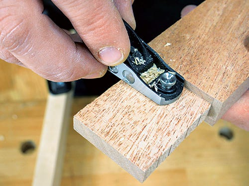 Cleaning a tenon with a small hand plane