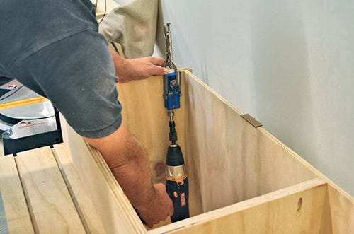 Setting up pocket holes for installing miter station cabinet top