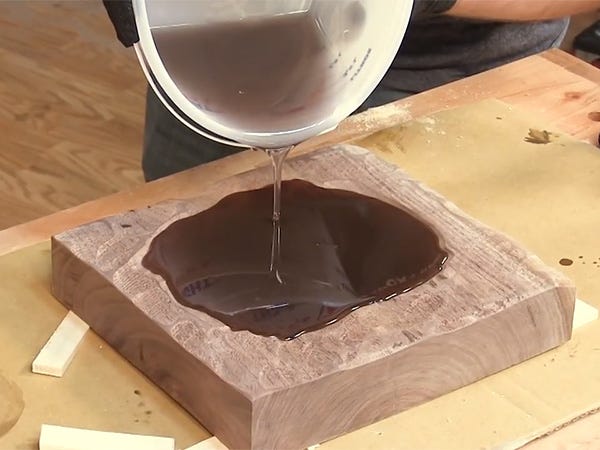 Pouring MAS epoxy to fill a void in wood